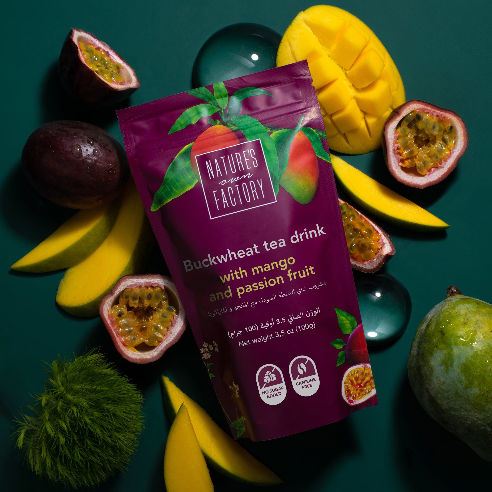 Nature's Own Factory buckwheat tea with mango and passion fruit, package with ingredients on a beige background