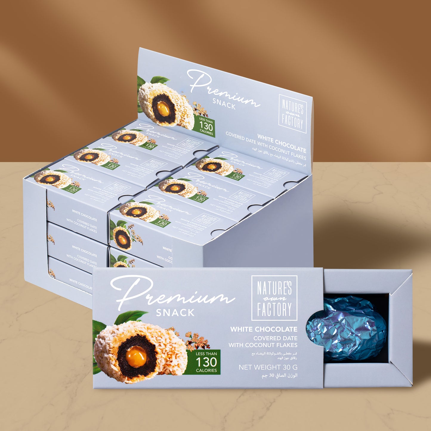 Natures own Factory chocolate covered date with coconut flakes 18 X pack, packaging on a brown background