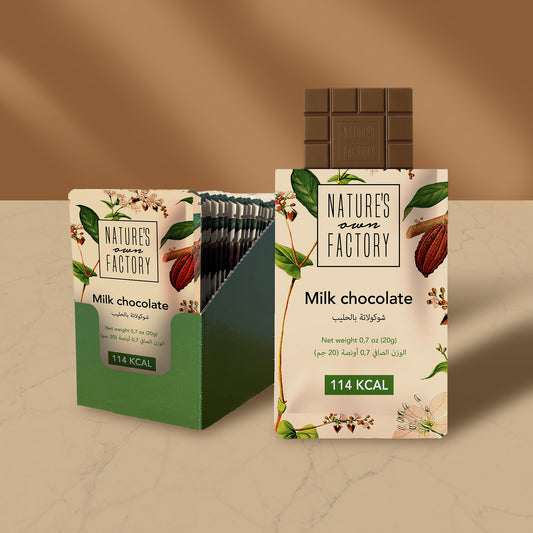 Nature’s Own Factory Milk Chocolate bar 24 packs, 20g artisan milk chocolate made from natural ingredients, displayed in eco-friendly packaging with cocoa and buckwheat illustrations.