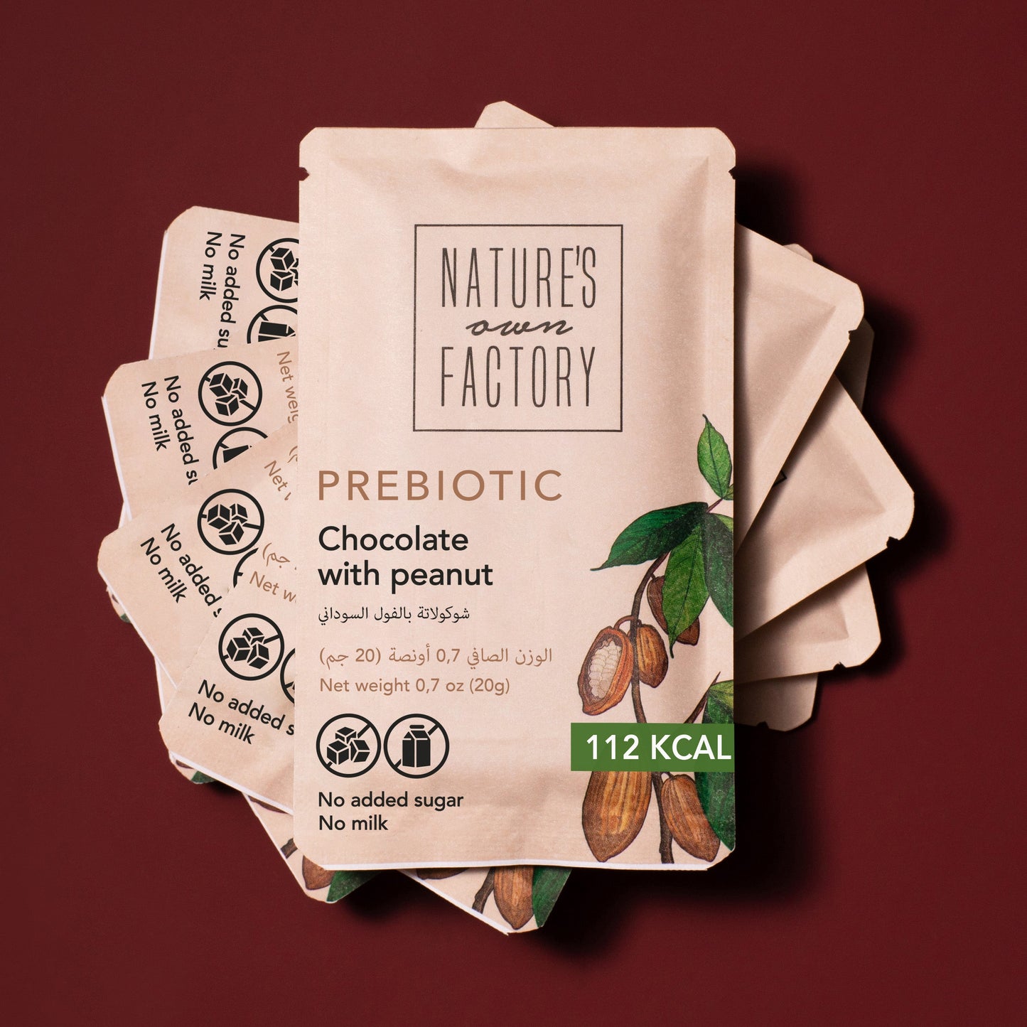 Prebiotic chocolate with peanuts packaging from Natures Own Factory on a red background